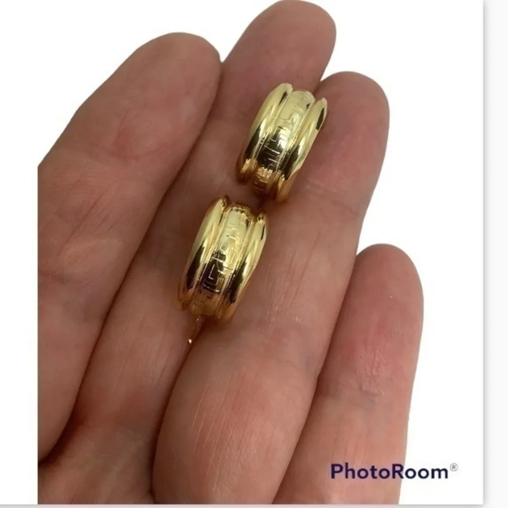 - Gold over sterling silver huggie earrings